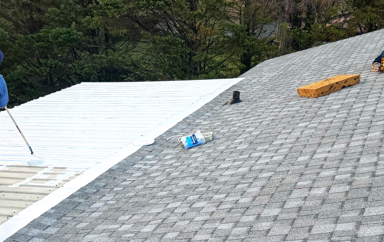 Roof replacement project showing installed roofing systems